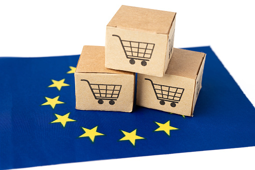 Box with shopping cart logo and EU flag, Import Export Shopping online or eCommerce finance delivery service store product shipping, trade, supplier concept.
