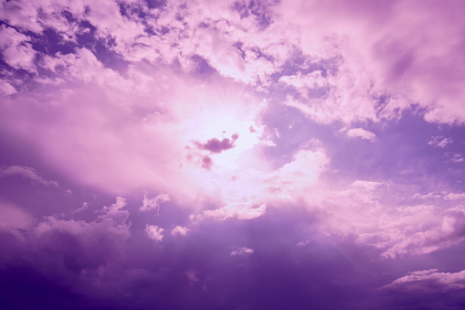 Violet sky with clouds.