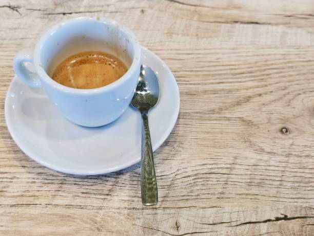 istock A cup of coffee on a wooden table 1263151757