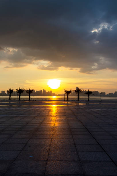 Sunrise and sunset on the city coast