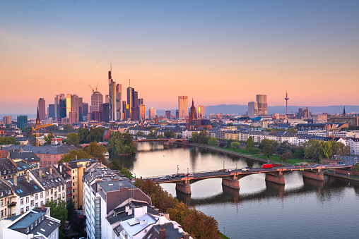 Frankfurt, Germany skyline over the Main River at dusk.