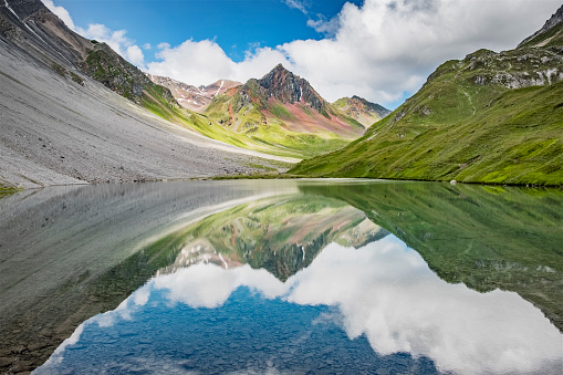 The photo shows the picturesque Aelpli lake in Arosa, Switzerland.