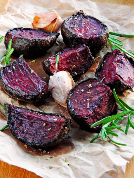 istock Beet baked with rosemary and garlic on paper. 1263159901