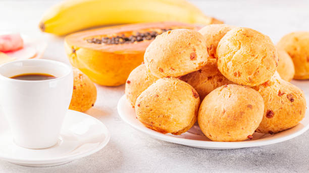 istock Traditional Brazilian breakfast - cheese bread, coffee, ripe fruit, selective focus 1263162187