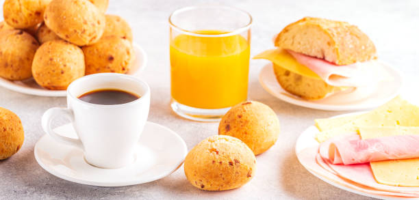istock Traditional Brazilian breakfast - cheese bread, coffee, ripe fruit, selective focus 1263162267