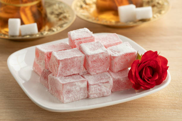 istock Turkish rose delight and a fresh rose 1263162926