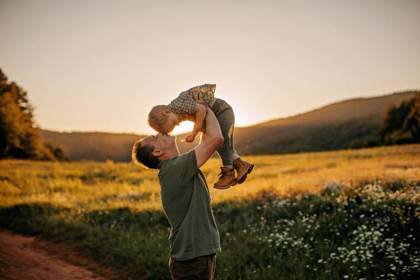 istock Grandfather and grandson enjoying nature 1263166570