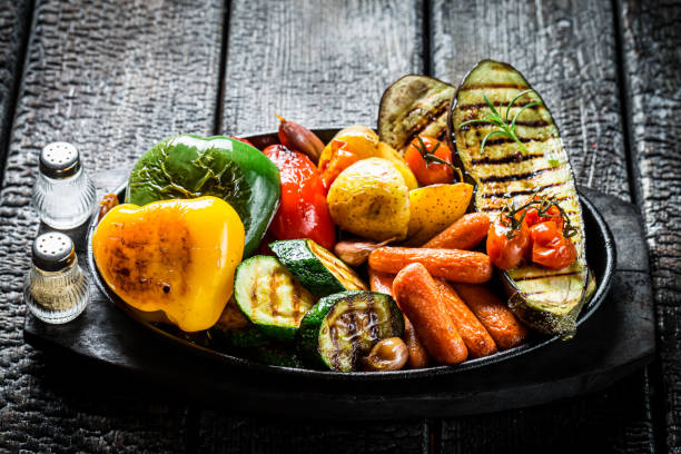 istock Grilled mix of vegetables on barbecue dish on burning table 1263169619