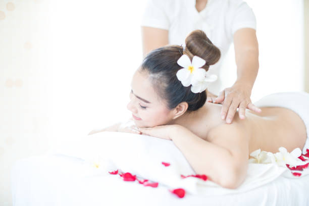 istock Asian woman massaging spa in window room 1263170826