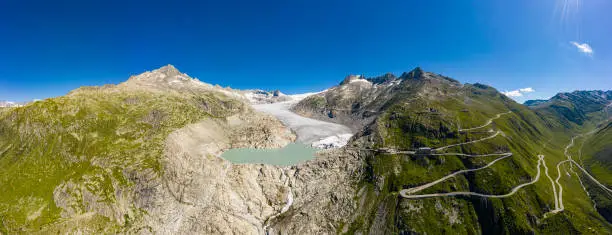 Rhone Glacier in the swiss alps and the Furka pass Aerial view Switzerland