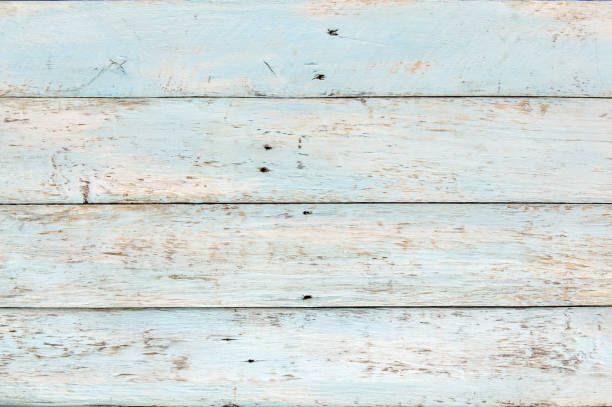 istock Bright light blue colored wooden background wood texture 1263179378