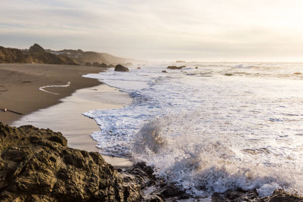 istock waves crashing on the rocks 1263215351