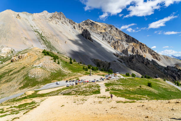 the summit of the the col d'izoard (2360 m), a mountain pass connecting briancon on the north and the valley of the guil in queyras, huates alpes, france - 2360 imagens e fotografias de stock