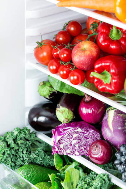 istock Colorful vibrant fresh vegetables in refrigerator 1263227974