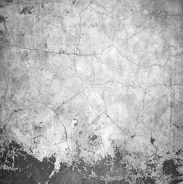 istock Old dark cracked gray white wall texture background 1263231028