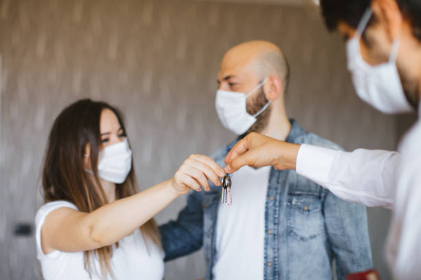 istock Real Estate Agent with a protective face mask 1263234240