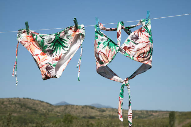 istock Swimsuits hanging on a line to dry 1263241250