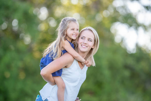 istock Mother and daughter outside 1263245754