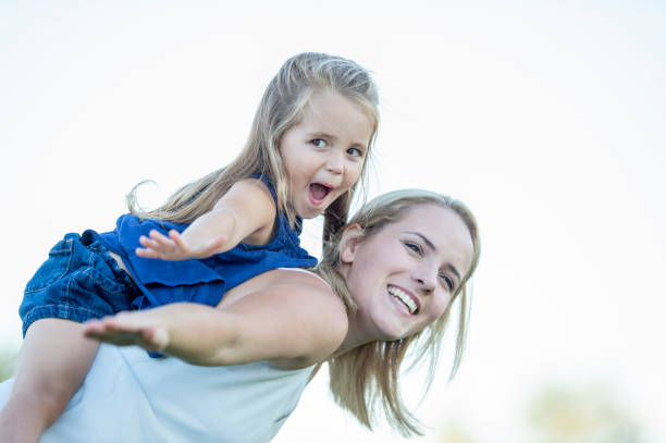 istock Mother and daughter outside 1263245755