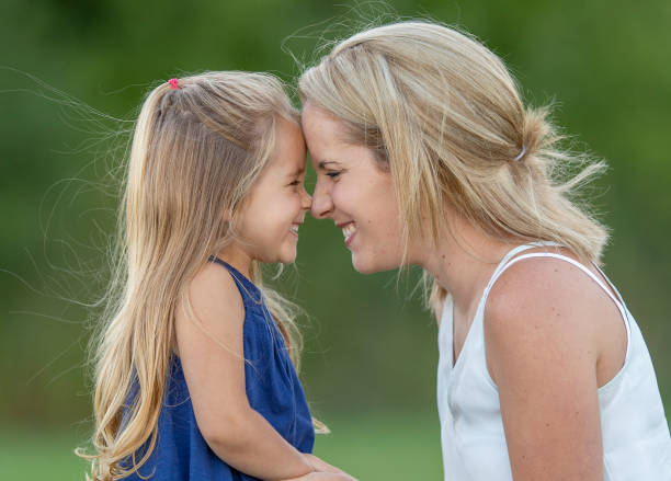 istock Mother and daughter outside 1263245802