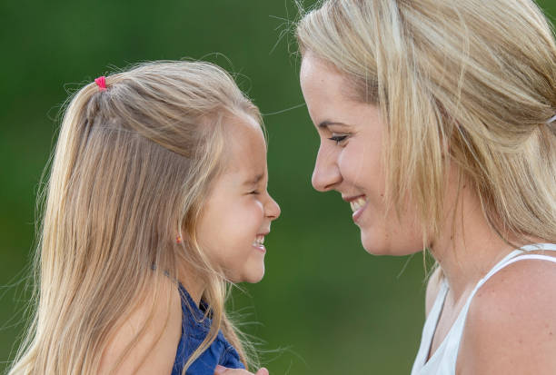 istock Mother and daughter outside 1263245814
