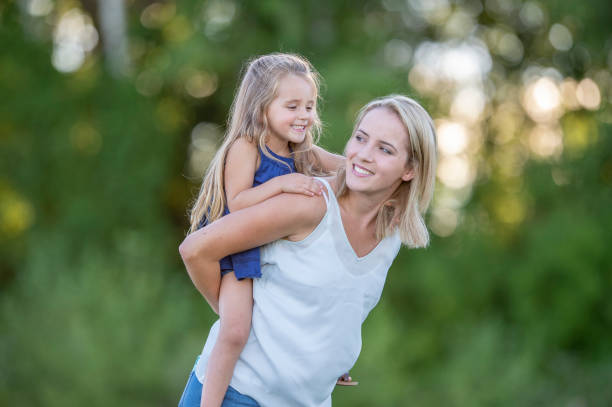 istock Mother and daughter outside 1263245821