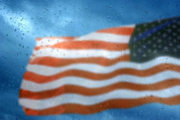 istock Waving American flag in rainy day 1263248208