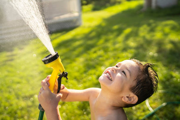 istock Garden hose fun in garden 1263252867