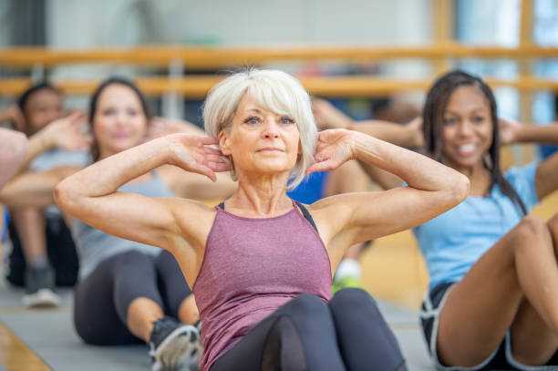 istock Senior woman does a sit-up 1263254189
