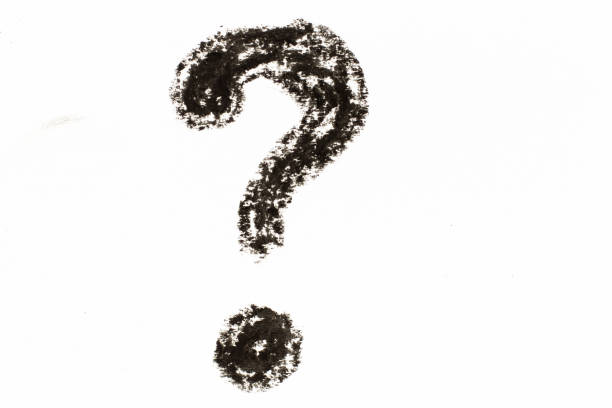 istock Black color oil pastel drawing in question mark shape on white paper background 1263254420