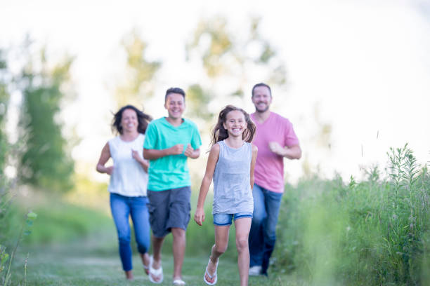 istock Happy family outside together 1263257888
