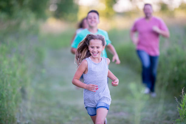 istock Happy family outside together 1263257894