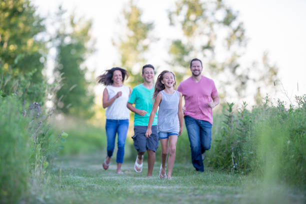 istock Happy family outside together 1263257901