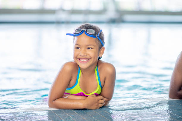 istock Young kids at the pool 1263259312