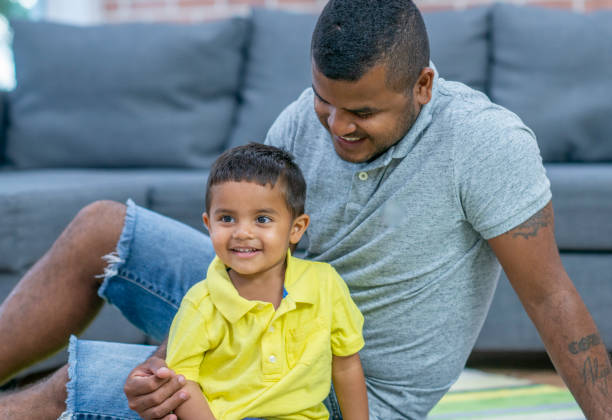 istock Young family playing together 1263260450