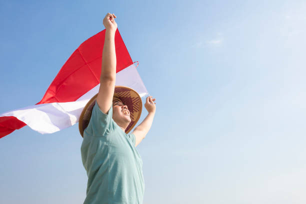 istock Indonesian Farmer Celebrating Independence Day 1263264371