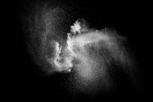 istock White talcume powder explosion on black background. White dust particles splash. 1263268099