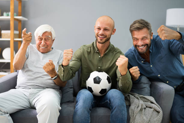 istock Three Generation Sport Fans Watching Football 1263279601