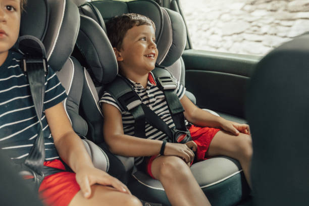 istock Happy playful kids travelling by car 1263279825