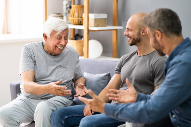 istock Grandpa Talking With Grandson And Son 1263282319