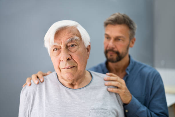 istock Old Senior Man With Dementia Getting Support And Care 1263283593
