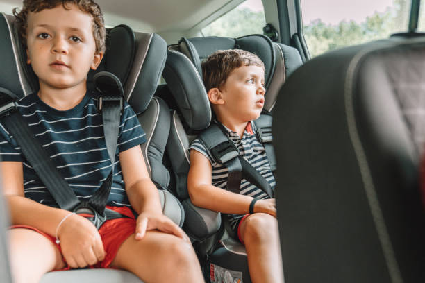 istock Happy playful kids travelling by car 1263283753