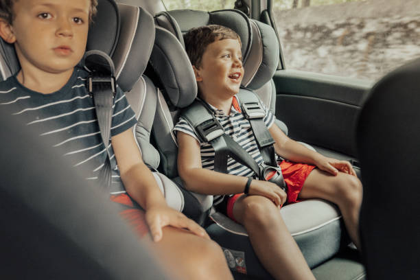 istock Happy playful kids travelling by car 1263283777