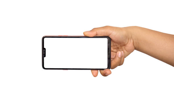 istock The hand is holding the white screen, the mobile phone is isolated on a white background. 1263287662