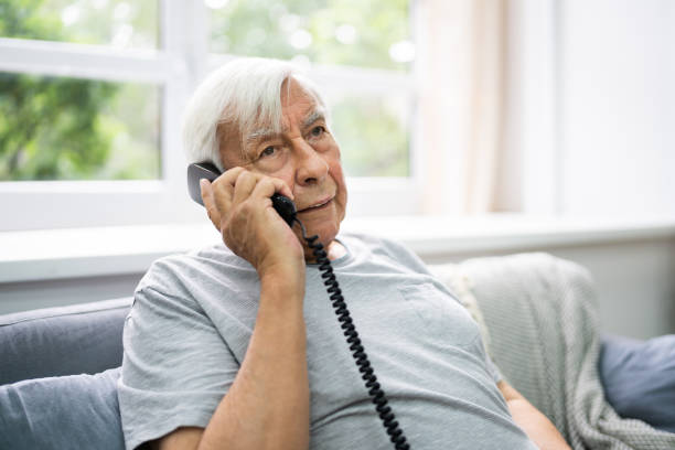 istock Senior Old Man Talking On Telephone 1263291902