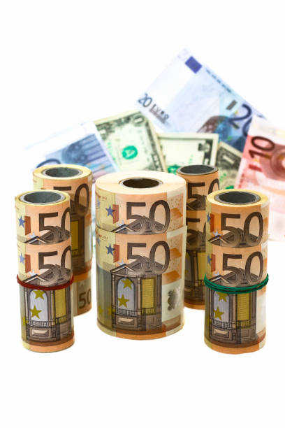 istock different denominations of banknotes in rolls and in bulk on a white background 1263294134