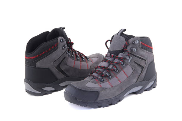 istock Man's winter mountain  boots, isolated on white 1263295205