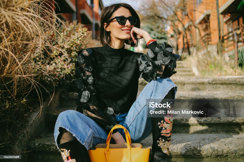 Young woman's fashion style - Young pretty fashioned girl Young pretty fashioned girl - Eccentric fashion Women Stock Photo