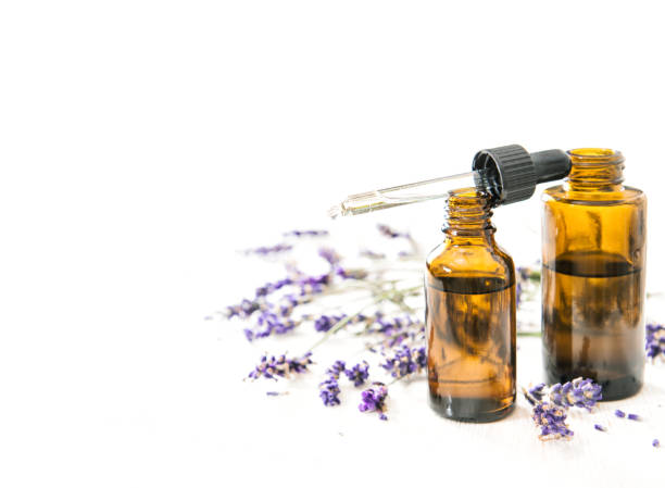 istock Herbal oil lavender flowes white background 1263308775
