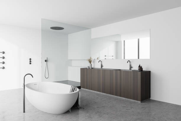 istock White bathroom corner with tub, shower and sink 1263308798